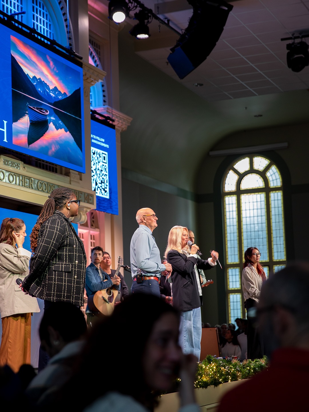 Diverse congregation gathered in worship inside the church